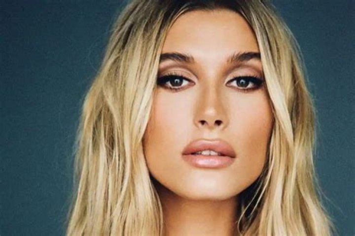 Hailey Bieber Pairs Daisy Dukes With Knee High Boots — See The Look