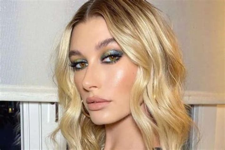 Hailey Bieber Says Goodbye To Summer In A Skimpy, Barely There Two Piece Bathing Suit