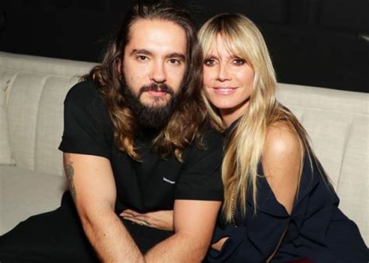 Heidi Klum And Tom Kaulitz Kiss Behind Plane Of Glass As Couple Self Quarantines Amid Coronavirus Pandemic