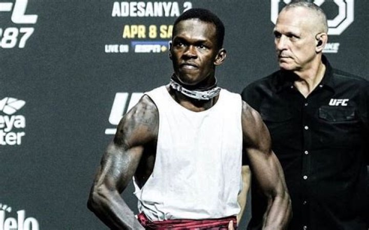 How tall is Israel Adesanya? How much does Israel Adesanya weigh?