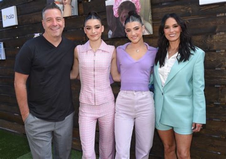 Influencer Charli D'Amelio Shares Swimsuit Photo of "Family Forever" — Celebwell