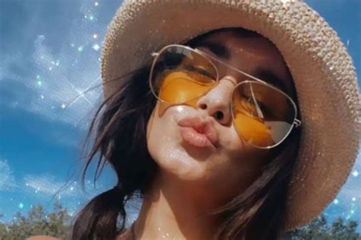 Vanessa Hudgens Showcases Her Abs In KYA Swim Two Piece Bathing Suit