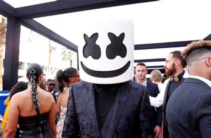 Why does Marshmello wear a hat or mask?